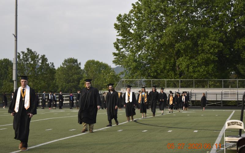 Midge Roach • Clay County Progress The Hayesville High School Class of 2023 enters the Frank R. Long Memorial Stadium for commencement.