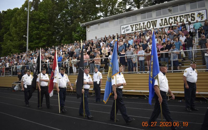 The American Legion presents the colors at the graduation ceremony.