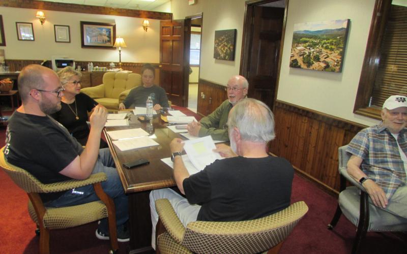 Lorraine Bennett • Clay County Progress At Monday’s meeting, from left, Councilman Austin Hedden, Town Clerk/Finance Officer Suzanne Hedden and Councilwoman Lauren Tiger listen while Councilman Harry Baughn makes a point.