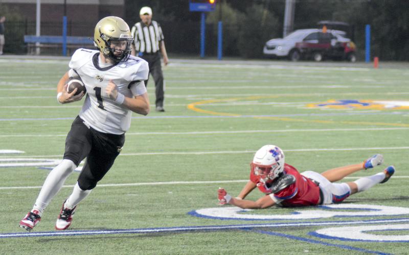 Gary Corsair • Clay County Progress For the second week in a row, Peyton McGaha, No. 1, turns the corner on the way to a long gain.