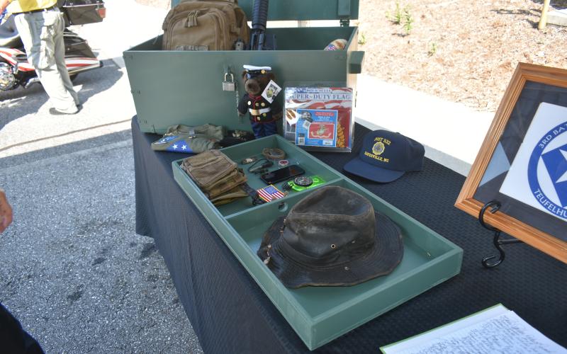 Becky Long • Clay County Progress Marine Lance Corporal Sean Willey’s belongings found at the campsite were placed in a hand-crafted box which accompanied him home to LLion, N.Y.