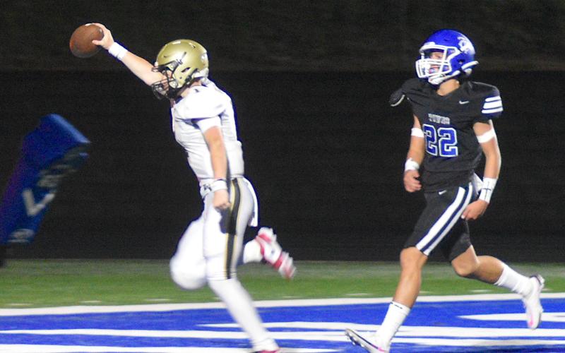 Gary Corsair • Clay County Progress Freshman Peyton McGaha celebrates a 39-yard touchdown run on his third play as a varsity quarterback. McGaha's beautiful run was nullified by a penalty, but No. 1 promptly completed a 31-yard pass to set up a touchdown.