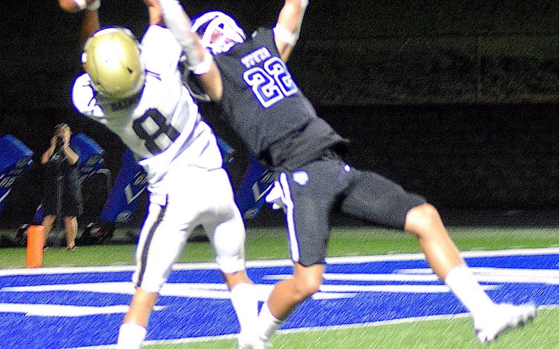 Gary Corsair • Clay County Progress Ben Bethel, No. 8, hails in a 31-yard pass from Peyton McGaha to set up Hayesville/s fourth touchdown.