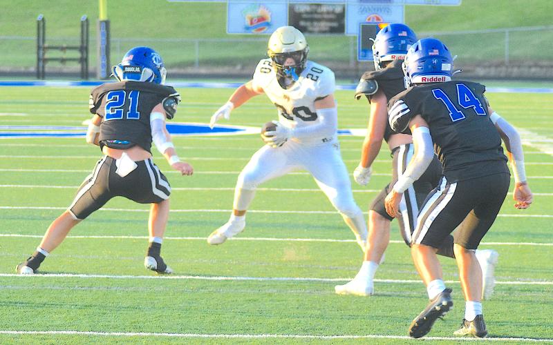 Gary Corsair • Clay County Progress Ben Bethel, No. 8, hails in a 31-yard pass from Peyton McGaha to set up Hayesville/s fourth touchdown.