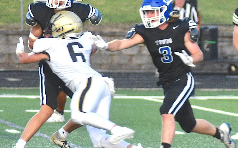 Gary Corsair • Clay County Progress Tre Graves, No. 6, breaks into the Towns County backfield to saddle the Indians with a loss.