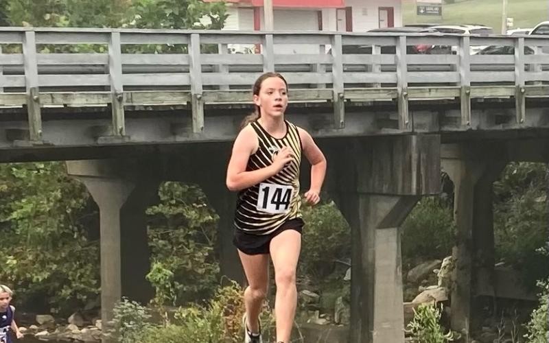 Annie Godfrey, 7th grade, attacks the home stretch.