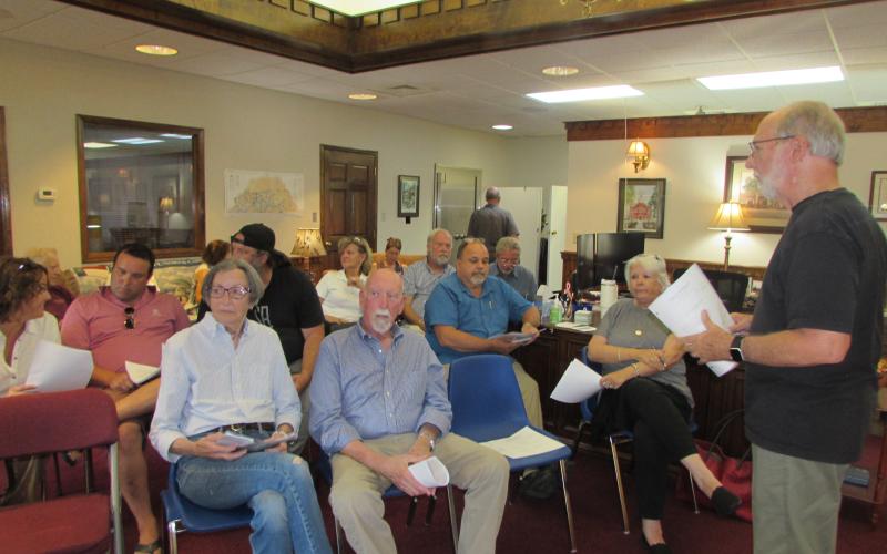 Lorraine Bennett • Clay County Progress Hayesville Mayor Joe Slaton, standing, addresses the crowd at Monday’s Town Council meeting.