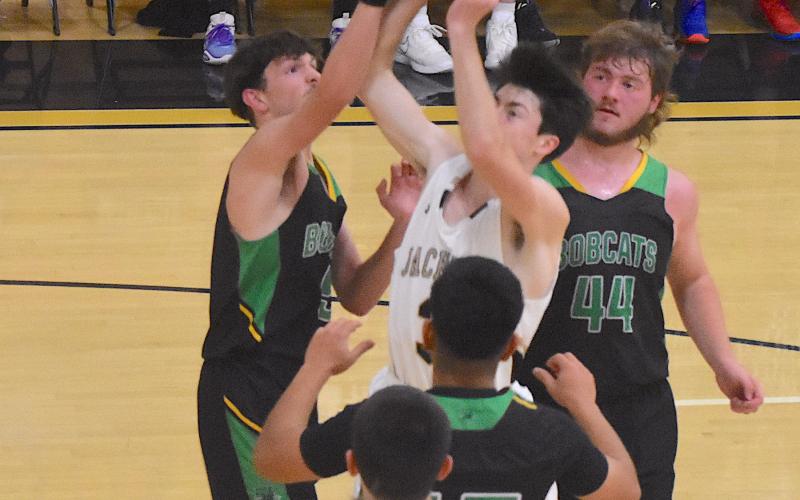 Gary Corsair • Clay County Progress Slade Crouch, No. 3, gets to the cup to increase Hayesville's first-quarter lead over Blue Ridge Early College.