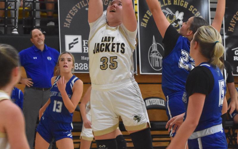 Gary Corsair • Clay County Progress Hayesville center Mallory Peck, No. 35, powers in a bucket against Hiwassee Dam.