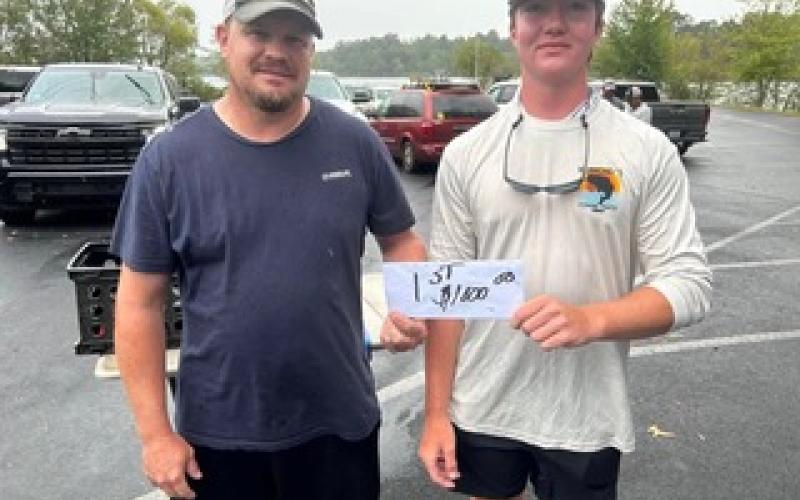 Jeremy Cross and Logan Russell are winners in the Clay Masonic Lodge fishing tournament.