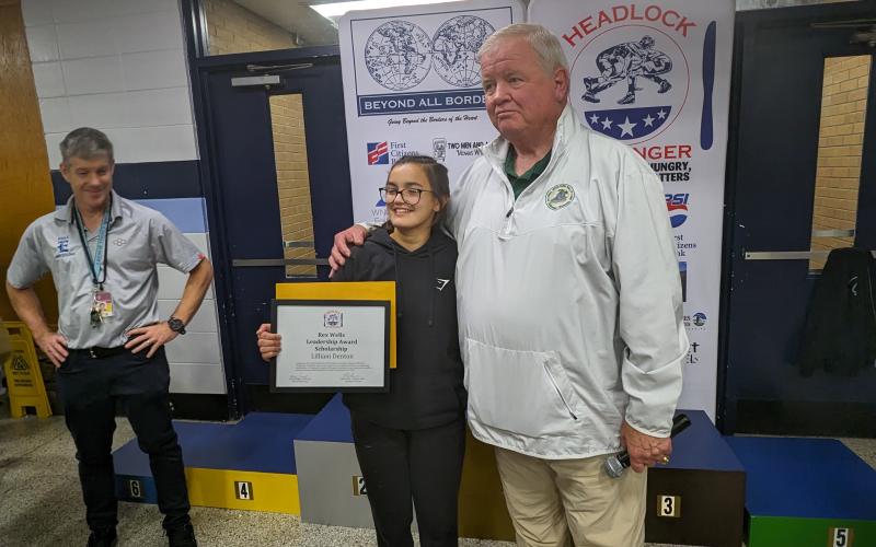 Lilliani Denton receives award from Rex Wells.