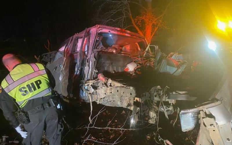 N.C. Trooper Robertson investigates the mangled remains of a 2019 Ford F150 after it crashed Monday on Cherry Road.