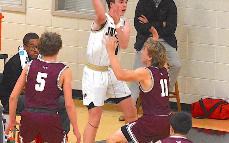 Gary Corsair • Clay County Progress Hayesville's Luke Lee, No. 4, whips a pass inside.