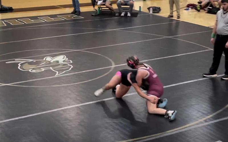 Lilli Denton in the middle of a take down.