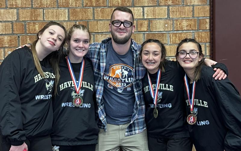From left, Katie Miller, Lakota Shelton, Coach Daniel Sherlin, Lilli Denton and Amyna Denton take home medals at tournament.