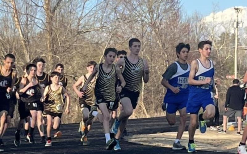 Photo by Carrie Hood Porter Hood, Micah Moss and Bronc Woody race against HDR and Murphy runners to the finish line.
