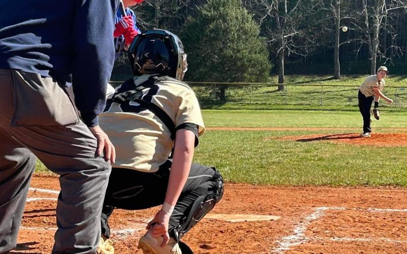 Photo by Ryan Hood Matthew Peck on the mound pitches to his catcher, Camden Taylor.