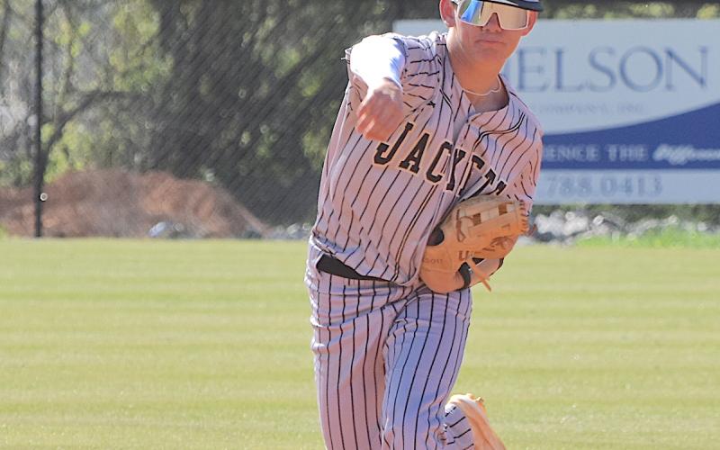 Gary Corsair • Clay County Progress Hayesville's slick fielding second baseman Michael Mauney, No. 1, makes a pinpoint throw to first. "Money" Mauney drove Towns County to distraction with three hits, three runs and two RBIs.