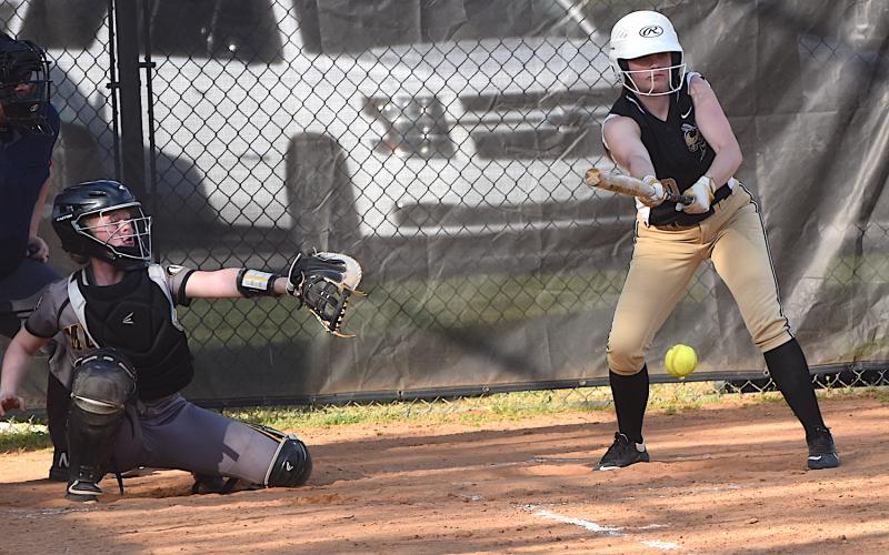 Gary Corsair • Clay County Progress Hayesville infielder/outfielder Madison Graves drops a bunt against Murphy.