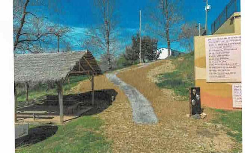 Photo by Ron Wallace The Hayesville Town Council viewed photographs of the walking trails from Cherokee Village  up to the Old Jail Museum.