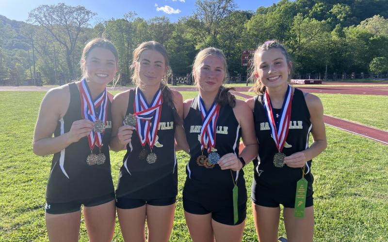 4x400 relay team, from left, Savannah Burch, Briley Clampitt, Skylar Lockaby and Ava Shook.