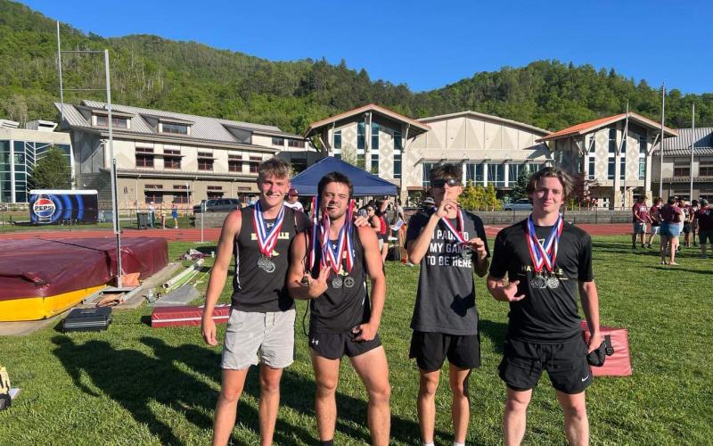 The 4x200 track team members are, from left, Isaac Chandler, Seth Leek, Elio Murillo and Kenyon Rogers-Gibby.