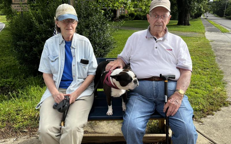 Deby Jo Ferguson • Clay County Progress Susie Curtis, Sparky and Harold McClure take a break from their walk to enjoy the scenery.