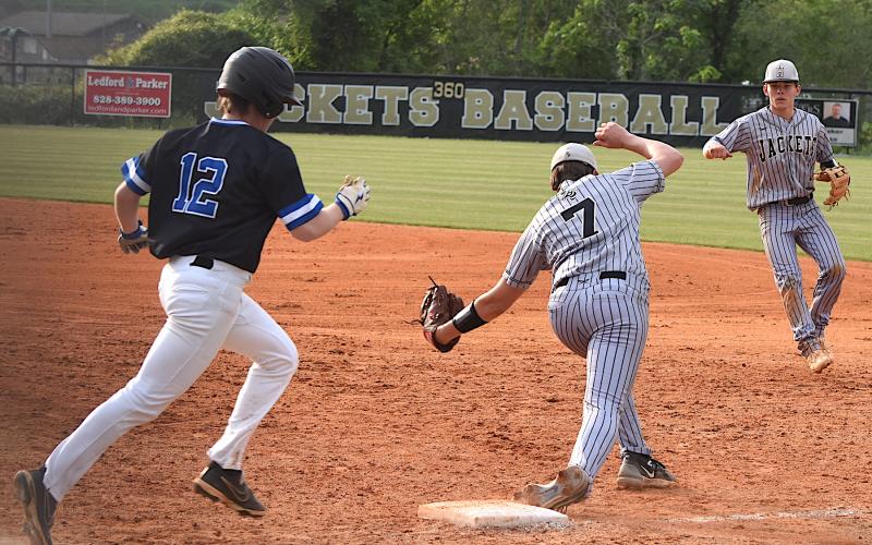 Gary Corsair • Clay County Progress Hayesville's Cade Caruso has the ball and the bag but the Bethany Community runner was declared safe on this seventh-inning play.