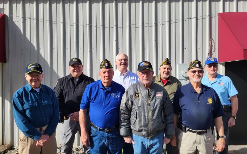 Midge Roach • Clay County Progress Among the veterans working on the Veterans Memorial Park project are, from left, Floyd Phillips, Todd Wingate, Rondall Brown, Robert Seibert, Dwight McClure, Bob Haas, Tommy Hooper and Phil Cantley. Part of the project includes the purchase of brick pavers to recognize and honor veterans.