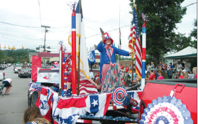 First Freewill Baptist Church and Carolina Christian Academy show off their patriotism with a beautiful red, white and blue float complete with Uncle Sam during last years Fourth of July Parade on the Hayesville town square.