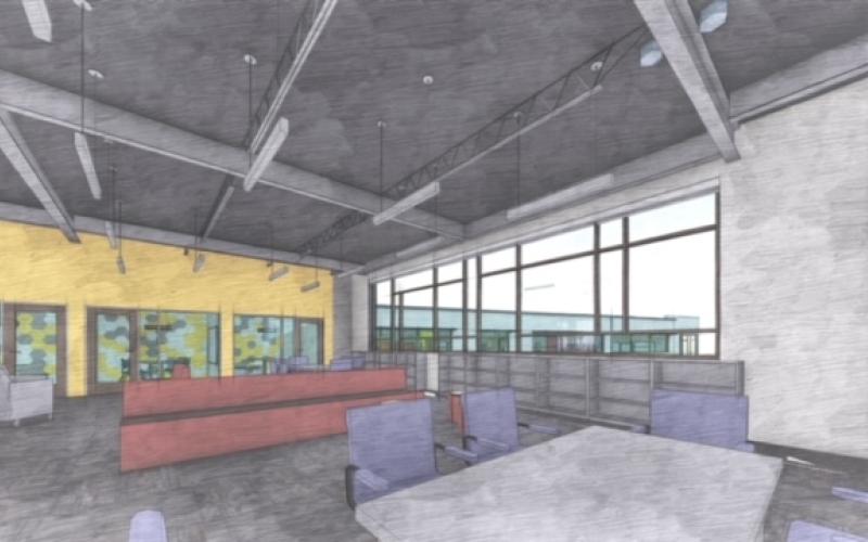 The back wall of the media center will have rooms where students working in small groups can work quietly.