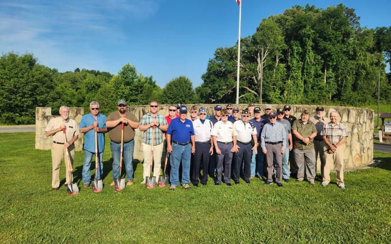 Photo • Betty Bradley Clay County Commissioners join with veterans to break ground on a Veterans Park which is slated for the first phase of opening in November of this year. Among those participating in the ceremony are, from left, Commissioners’ Clay Logan, Dwight Penland, Randy Nichols, Rob Peck and Scotty Penland along with the show of support from local veterans.