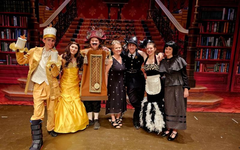 Peacock Performing Arts production of “Beauty and the Beast’s Secret Garden” are, from left, Lumiere - Lincoln Carpenter; Belle - Katelyn Elver; clock - Lucas Craddack; director Robbie Dernehl; sheriff - Hayden Stancil; Dusty - Ryleigh Elver and governess Emma Elmore.
