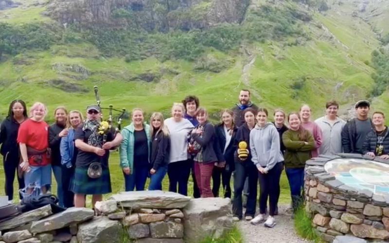 Photos from Clay County Global Studies Facebook page Global Studies students with bagpiper. Nineteen Clay County students traveled to Scotland in June with several adult chaperone’s. The Global Studies program participants visited Ben Nevis Mountain in Scotland as one of many sites on their trip.