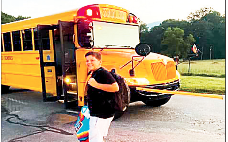 Gracie Taylor • Clay County Progress Noah Swope is all smiles after fi nishing his fi rst day in the sixth grade and marking a new beginning at Hayesville Middle School from elementary. Swope was among more than 1,300 students to return to the classroom on Monday.