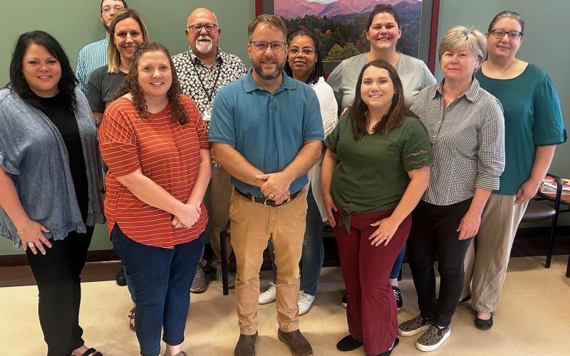 Photo submitted by Clay DSS September is Child Welfare Workforce Development Month.  Clay County DSS staff are, from left front, Kim Spurling, Courtney Robertson, Todd Goins, Kayla Nelson and Ginny Lacek; back, James Chandler, Nicole Byrne, Rex Ledford, Jeryl Waddy, Chelsea Padilla-McCabe,and Haven Phillips.