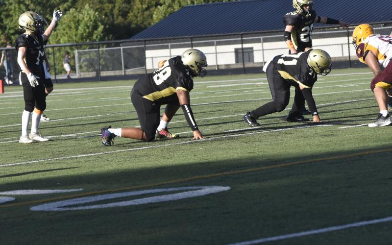 Leeanna Alberta • Clay County Progress No.78, E.J. Mapasua and No. 71, Jonathan Godomez prepare for take-down.