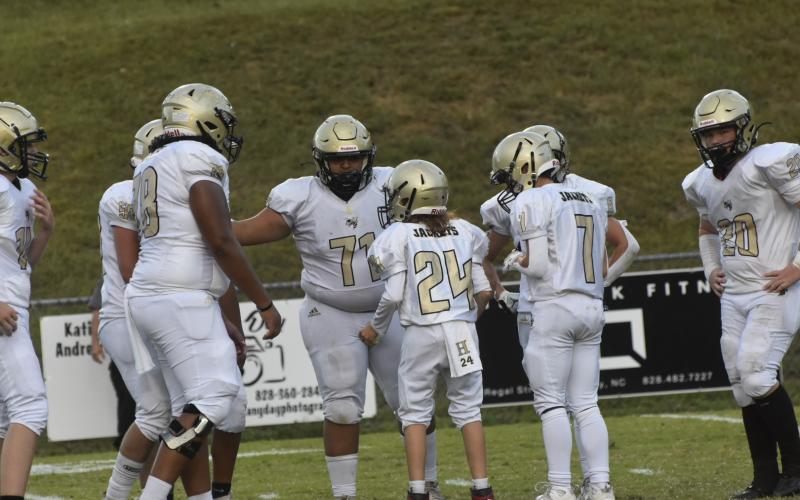 Leeanna Alberta • Clay County Progress Jackets come in for a huddle led by, No. 24, Hunter Hill during Thursday’s game.