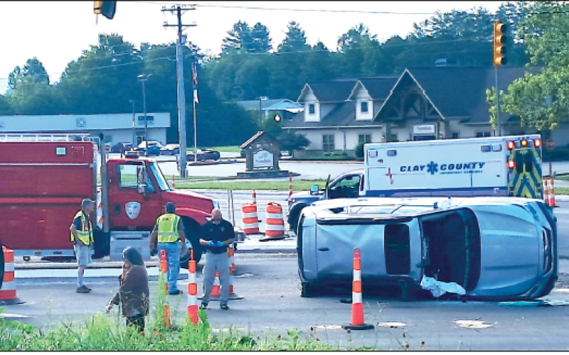 Becky Long • Clay County Progress Rescue workers secure the scene of a two-car traffic accident at the heavily travelled bypass intersection in Hayesville.