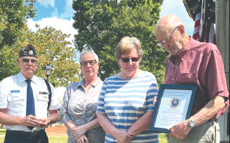 Honoring Sgt. Robert “Bob” N. Roach, WWI, was his Gold Star family, from left presenting Phil Cantley, Midge, Doris and Ed Roach.