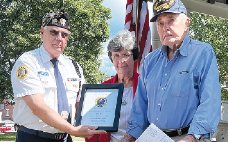 Paying honor to Pvt. Columbus Myers WWI was his Gold Star family, from left presenting Phil Cantley, Becky Brown and Ralph Myers.