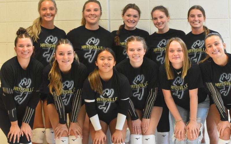 Leeanna Alberta • Clay County Progress Hayesville Yellow Jacket varsity volleyball players are, front, from left, Bryleigh Krieger, Reese Segars, Phoebe Pietilla, Brittany Jack, Madison Graves and Savannah Burch; back, Ella Matheson, Mallory Peck, Madison Moore, Olivia Giddens and Ava Shook.