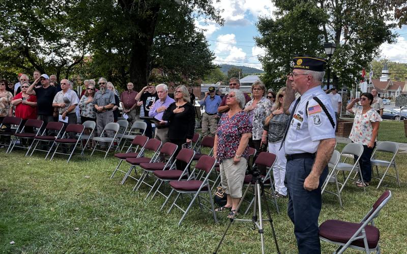 Crowd pays respect at POW/MIA recognition as the Remembrance Flag was placed at its rightful position.