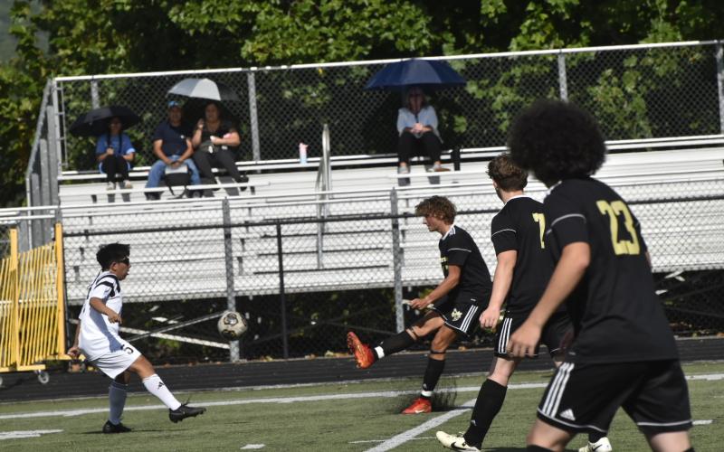 Leeanna Alberta • Clay County Progress Jackson Dye, No.18, kicks the ball back up from Chayce Barter, No.7, and Coldan Rhea, No. 23.