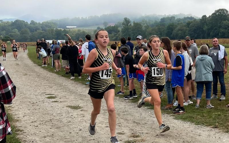 Leah Black, sixth grade, and Alaina Greenstone, seventh grade, finish fifth out of eight teams.