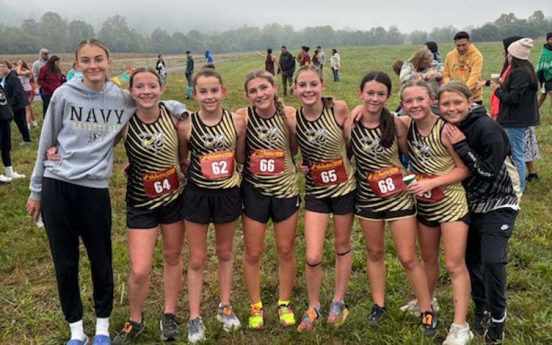 HMS Girls XC Team are, from left, Ellie Black, Annie Godfrey, Leah Black, Alaina Greenstone, Lily Gordon, Shelby Scarborough, Allie Godfrey and Kaelyn Cook