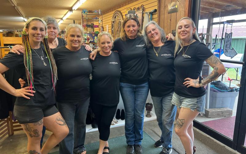 Lorrie Ross • Clay County Progress Some of the The Funny Farm Thrift Store crew are, from left, Kali Wigley, Gena Greene, Jeanne Strack, Stephanie Strack, Debbie Conigliaro, Karen Thomas and Marcie Aaron. The thrift store will benefit The Senior Scenter, a local sanctuary for small senior dogs and special needs animals, as well as Puppies Under Protection, the non-profit which supports the sanctuary.