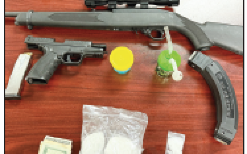 Officers reported firearms and meth in the suspect’s vehicle  and on his person.