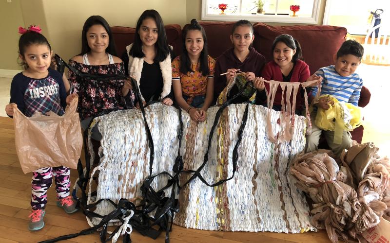 Sr. Terry led a project where young people used grocery bags to weave sleeping mats for the homeless, Dec. 2018.