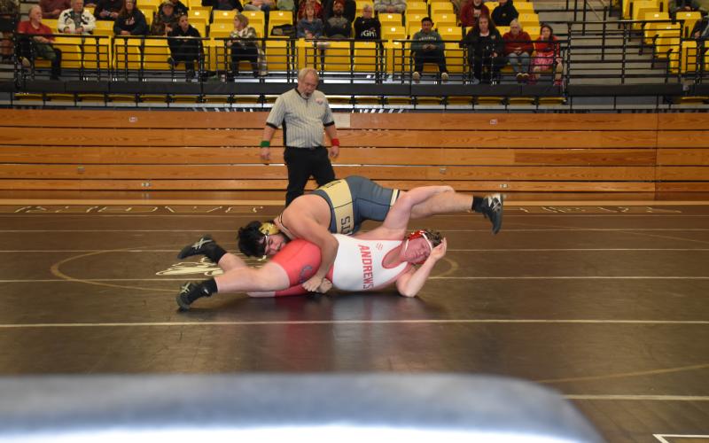 Norashae Patterson • Clay County Progress Rayland Martinez rolls over an Andrews player to pin him. 